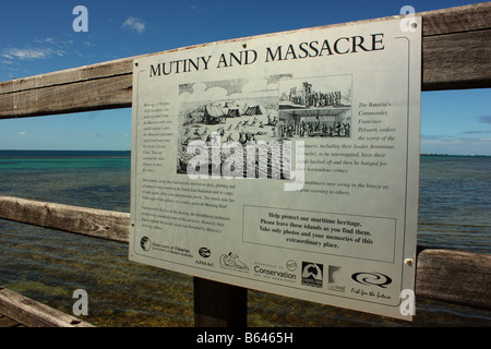 mutiny and massacare sign on smalll jetty on east wallabi island in the abrolhos islands Stock Photo