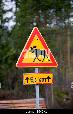 Finland, Kuhmo, road sign which warns for crossing moose. Stock Photo