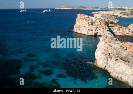 Clear sea and cliffs off the coast of Comino, Malta. Stock Photo