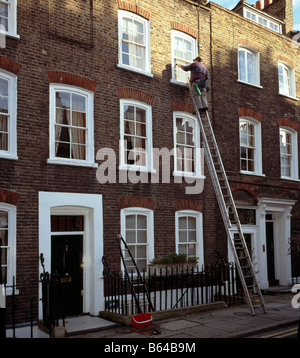 Window cleaner. Westminster, London, England, UK. Stock Photo
