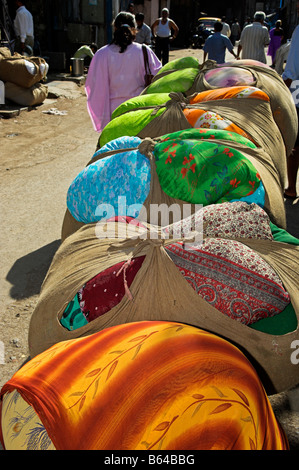 Washed clean clothes ready for return at Dhobi Ghat commercial laundry in Mumbai India Stock Photo