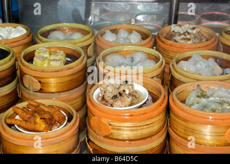 Bamboo steamer trays with dim sum choices at small restaurant in former City God Temple on Shanghai Old Street Stock Photo