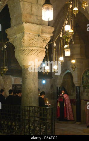 Israel Jerusalem Old City Holy Sepulchre Armenian daily procession in the church Stock Photo