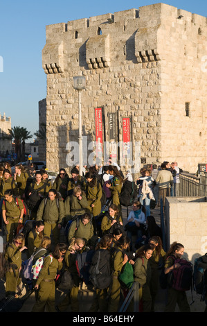 Israel Jerusalem Old City Jaffa Gate group of female soldier walking down the stairs with citadel of David in bkgd Stock Photo