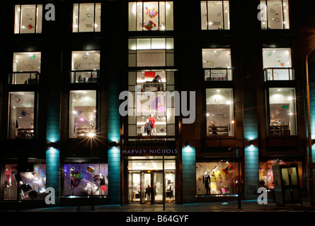 A night view of THE HARVEY NICHOLLS STORE IN ST ANDREWS SQUARE EDINBURGH SCOTLAND Stock Photo