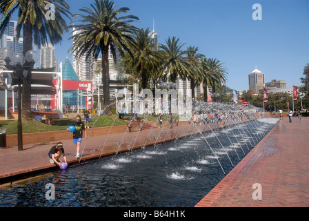 children playing in fountain Darling harbour Sydney Australia Stock Photo