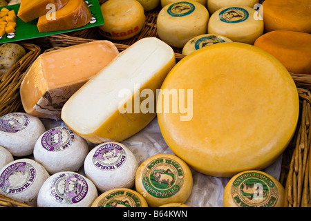 Dutch cheeses on market stall Netherlands Stock Photo