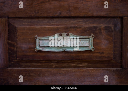 Letterbox or mail slot in wooden door in San Miguel de Allende Mexico Stock Photo