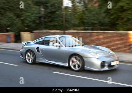 Porsche 911 Carrera silver Sports Car panning Stock Photo