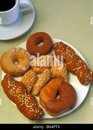 Iconic Greek Food Traditional Cookies KOULOURAKIA and Cup of Greek Coffee Stock Photo