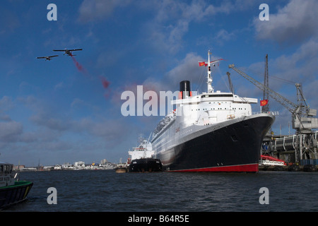 Poppies Being Dropped on the QE2 in Southampton Docks Stock Photo