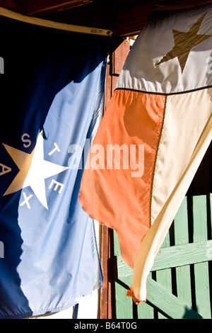 Texas Hill Country, Dixie Dude Ranch, old Texas flags on work shed Stock Photo