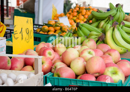 Selective focus close up of fruit on a fruit market including bananas apples and oranges Limone sul Garda Lake Garda Italy Stock Photo