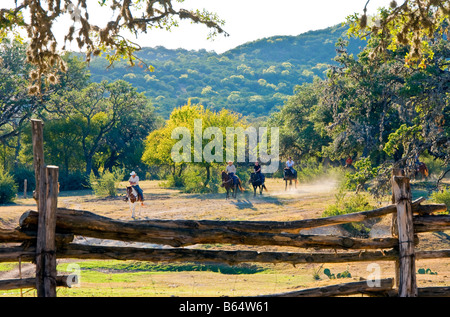 Texas Hill Country, Dixie Dude Ranch, riders returning to corral at days end Stock Photo