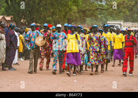 Two folklore dancing groups in Rumbek, South Sudan march into Freedom Square on Africa Malaria Day. Stock Photo