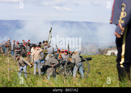 Confederate soldiers fire canons at the renactment of the Battle of Berryville. Stock Photo