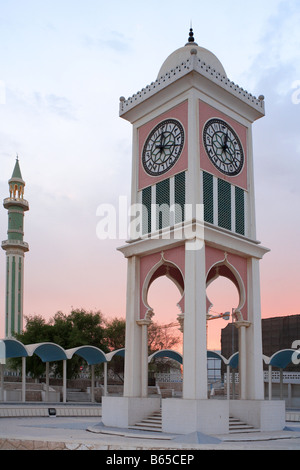 The old Clock Tower in central Doha, Qatar, next to the Emiri Diwan palace Stock Photo