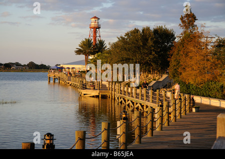 Lake Sumter Landing boardwalk at dusk Situated in central Florida America USA Sumter landing is a part of The Villages complex Stock Photo