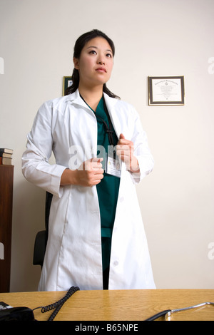 Female doctor in her office. Stock Photo