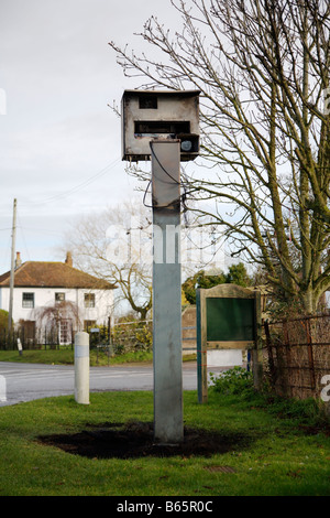 Burnt out saftey camera by roadside showing charred remains, Othery, Somerset Stock Photo