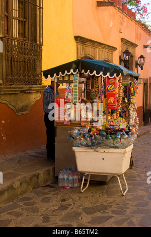 A vendor and his cart near the jardin in San Miguel de Allende, Mexico. Stock Photo