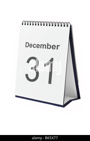 Desktop calendar showing December 31 isolated on white background Stock Photo