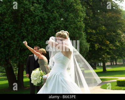 portrait of a bride in a park setting Stock Photo