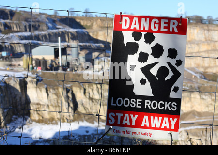 A danger warning sign at Tarmac's Dene Quarry, Cromford, Derbyshire, England, U.K. Stock Photo