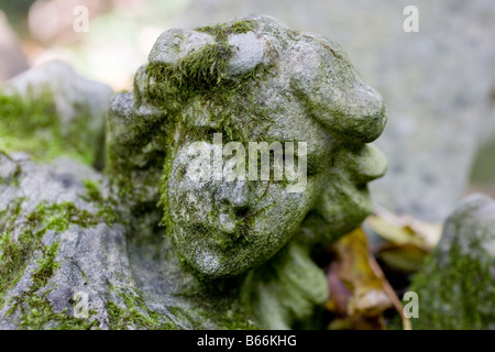 Head of an angel statue. Nunhead Cemetery. Southwark, South London, England, UK Stock Photo