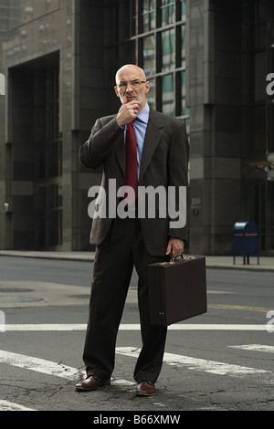Confused looking businessman Stock Photo