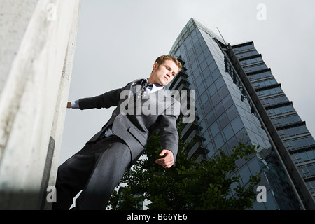 Businessman looking down Stock Photo