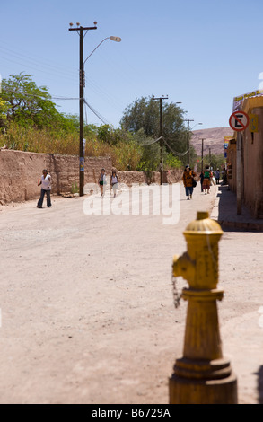 Fire hydrant on a San Pedro street corner, San Pedro de Atacama, Chile Stock Photo