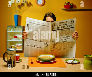 reading newspaper Stock Photo