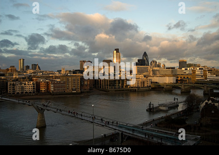 view over the thames and of the city of london with the new walking bridge between the south and north banks looking north from Stock Photo