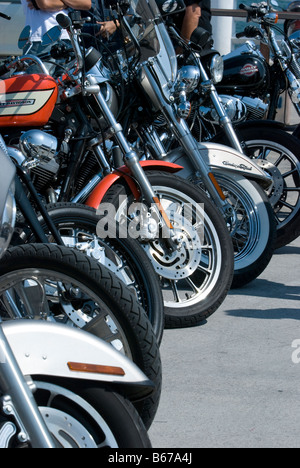 Front wheels of Harley Davidson motorcycles parked Stock Photo