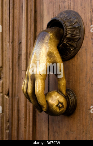 Brass door knocker on a wooden door in San Miguel de Allende, Mexico Stock Photo
