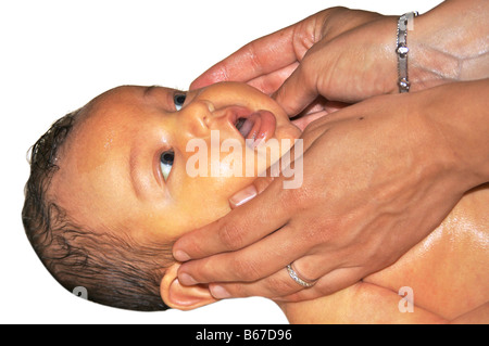 Baby boy being Massaged Stock Photo