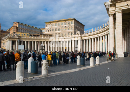 People waiting to get to Basilica Sant Pietro church in Vatican in Rome Italy Europe Stock Photo