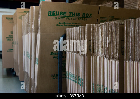 Cardboard moving boxes lined up ready for packing Stock Photo