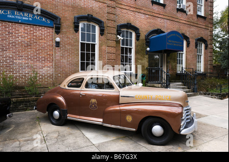 Vintage police car in front of the Metropolitan Police Department, Historic District, Savannah, Georgia, USA Stock Photo