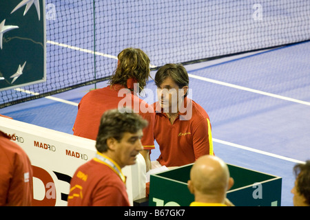 Spanish tennis player Feliciano Lopez receives direction from the Spanish Team captain Emilio Sanchez Vicario during the 2008 Stock Photo