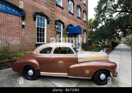 Vintage police car in front of the Metropolitan Police Department, Historic District, Savannah, Georgia, USA Stock Photo