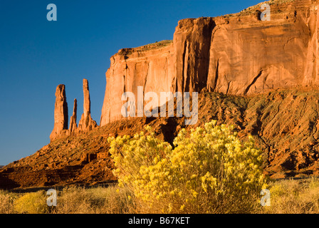 view of the three sisters sandstone formation in Monument Valley Stock Photo