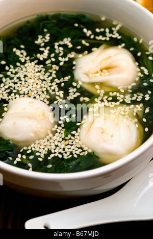 Close-up of Chinese dumplings in a bowl Stock Photo