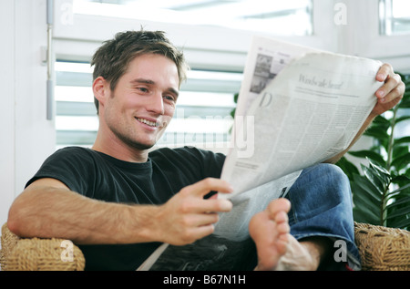 Young man smiling at camera, Munich, Germany Stock Photo