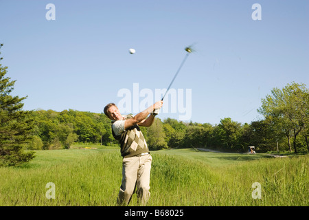 Man Golfing Stock Photo