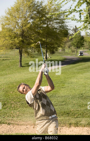 Man Golfing Stock Photo