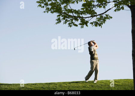 Man Golfing Stock Photo