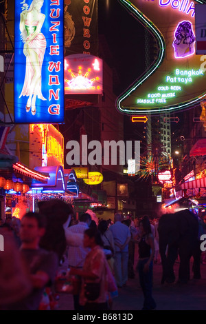 People strolling over Soi Cowboy with bars and nightclubs, red-light district, Th Sukhumvit, Bangkok, Thailand Stock Photo