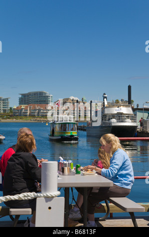 People eating Fish and Chips 'Fishermans Wharf' Victoria 'Vancouver Island' 'British Columbia' Canada Stock Photo